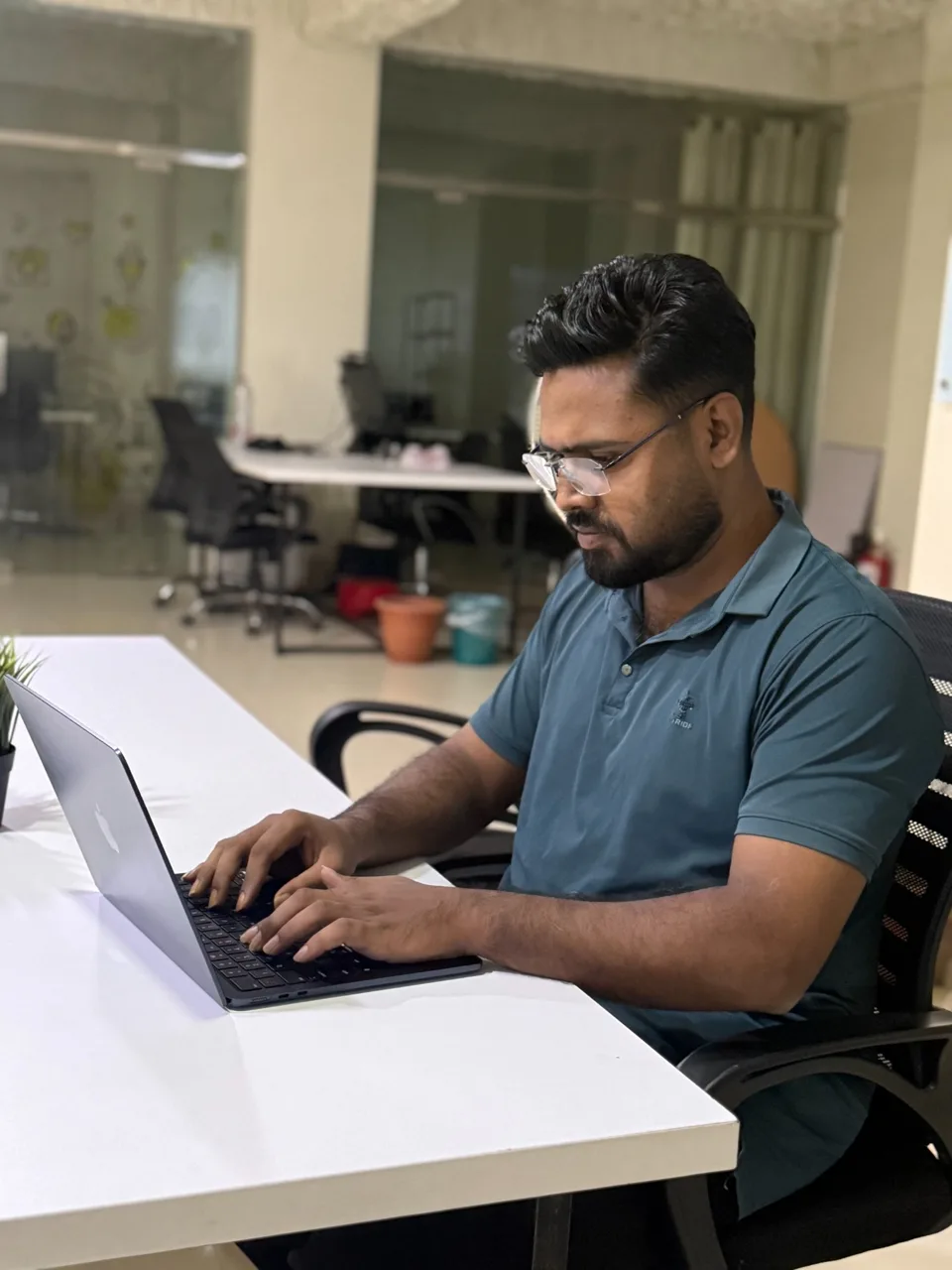 Jibon at his office desk